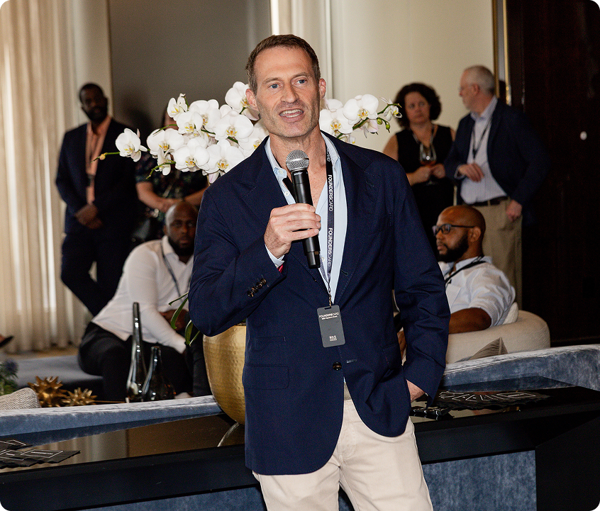 Eric Kuhn speaking at an event