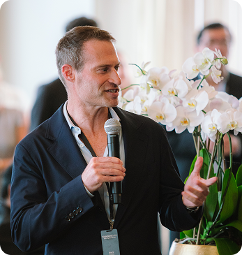 Eric Kuhn speaking at an event